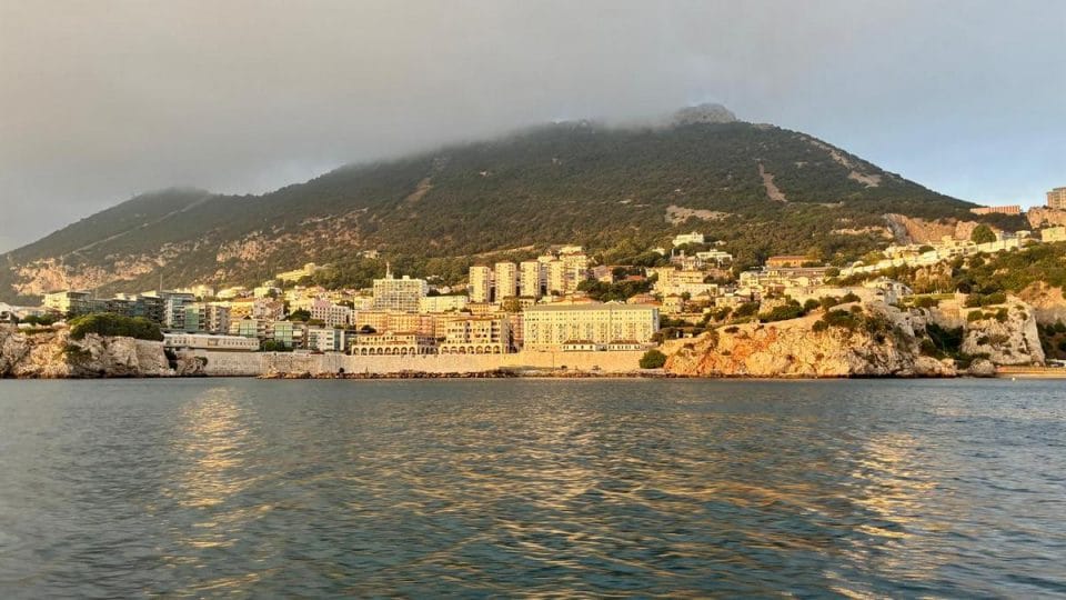 South District Gibraltar coastline and hillside residential area South District Gibraltar coastline with hillside residential properties and views of the Rock