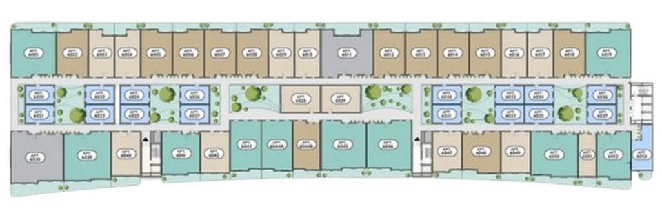 Sixth-floor apartment layout at Monument Plaza, Gibraltar, showing apartment positions and landscaped communal spaces. Monument Plaza Gibraltar sixth-floor plan showing numbered apartments arranged around landscaped courtyards.